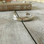 Alternate view of stamped spoon cuff bracelet labelled remember
