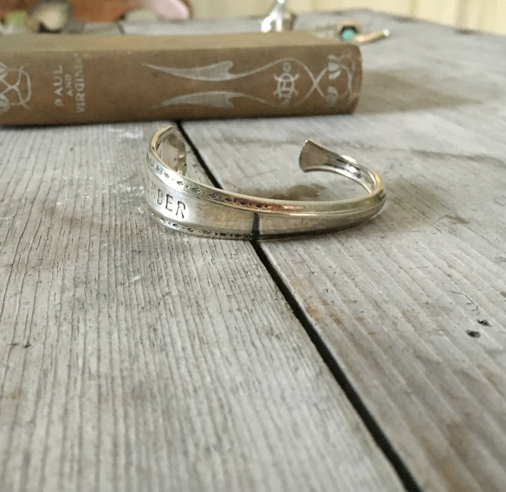 Alternate view of stamped spoon cuff bracelet labelled remember