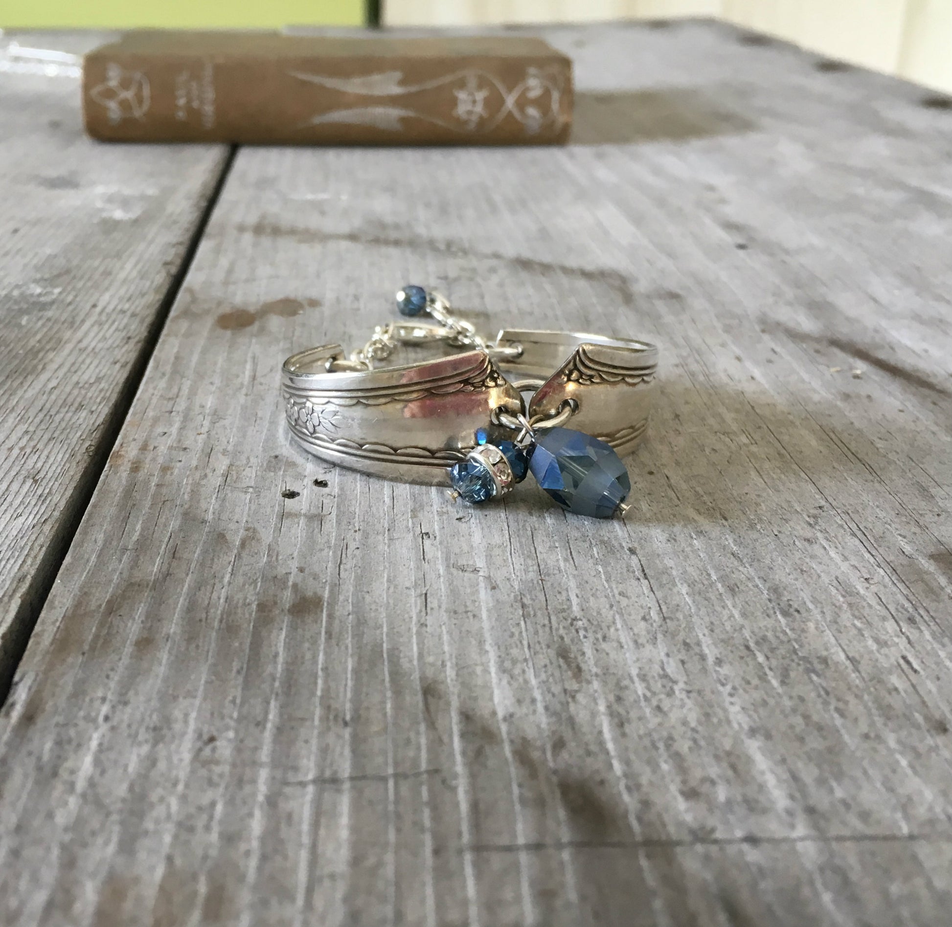 Spoon link bracelet with smoky blue glass beads