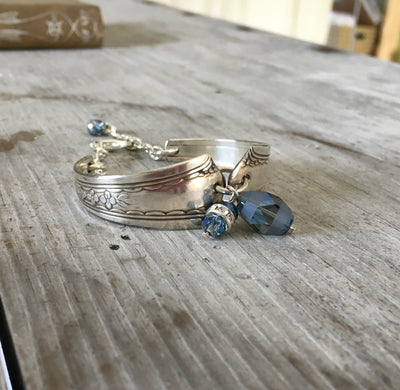 Silverplate link bracelet made from silverware spoon handles and accent with glass beads