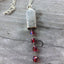 Bell Necklace made from upcycled silverware knife with red rosary beads
