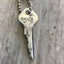 Hand stamped giving Key Grace