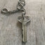 Born in the USA Stamped Key Giving Key Necklace