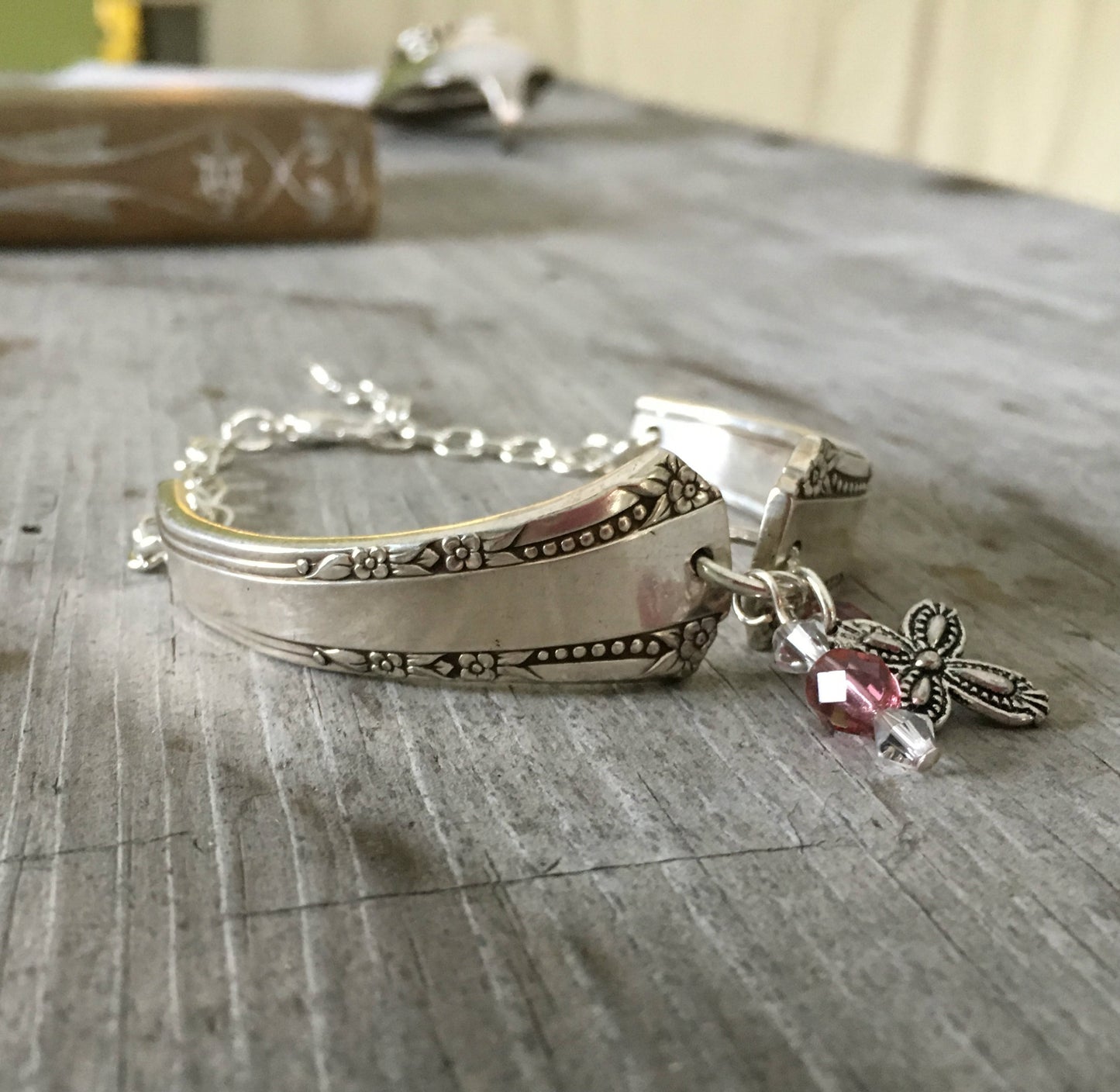 Bracelet made from upcycled silverware handles in the Del Mar pattern with bead accents