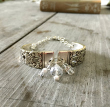 Closer view of Coronation Spoon Handle Link Bracelet with a multitude of clear and faux pearl beads