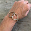 Bracelet made out of two hearts made from upcycled fork tines