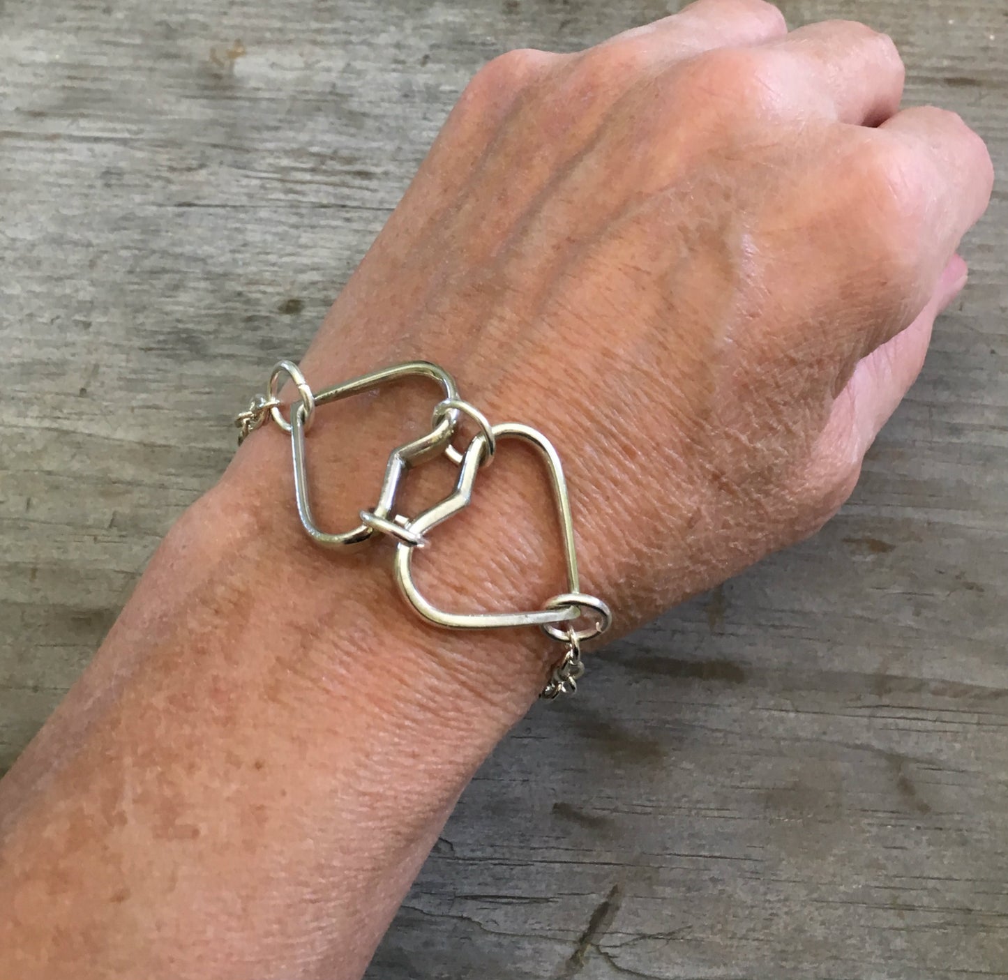 Bracelet made out of two hearts made from upcycled fork tines