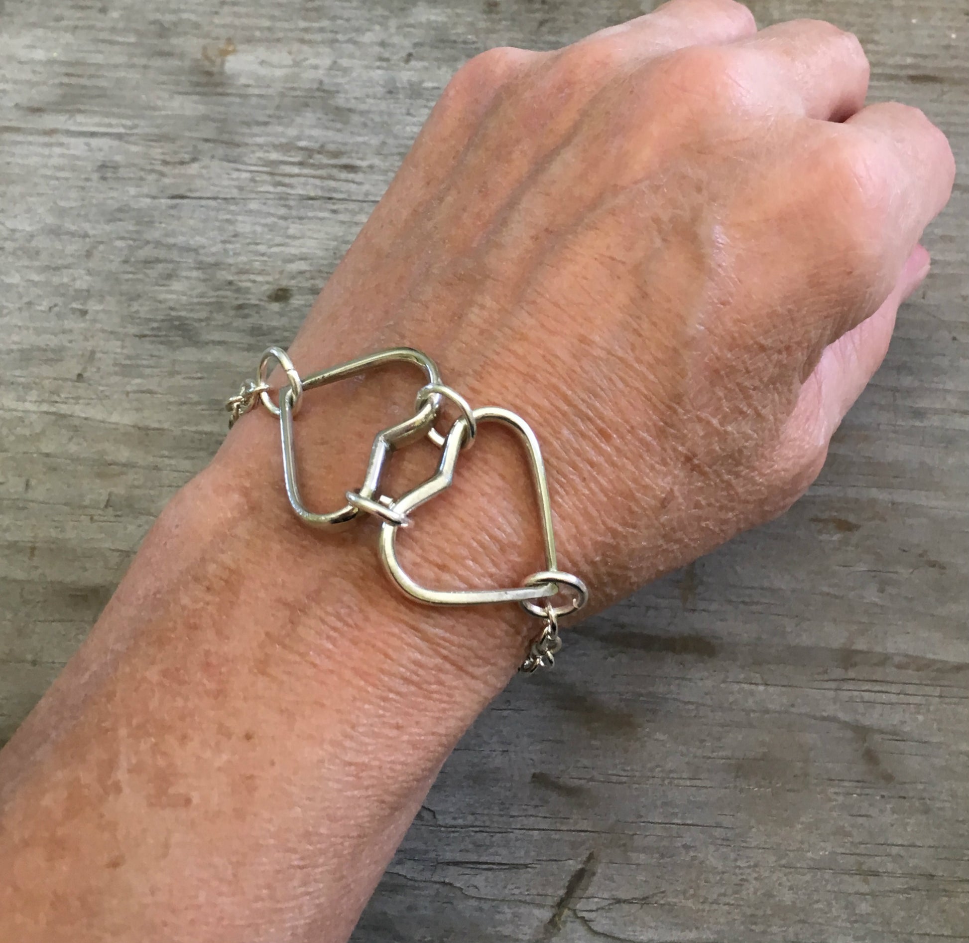 Bracelet made out of two hearts made from upcycled fork tines