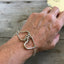 Two Hearts Fork Tine Bracelet Shown on Model