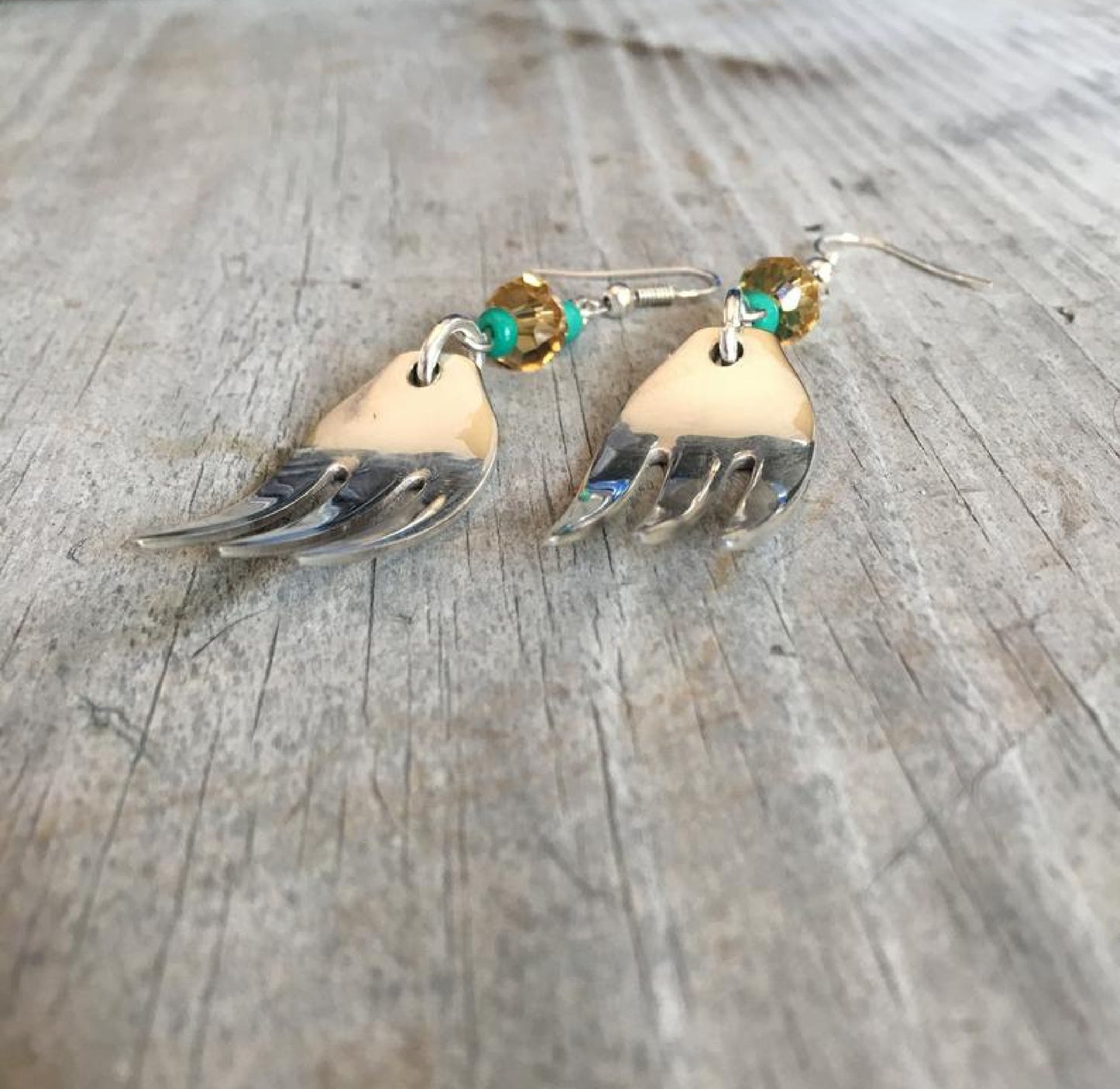 Fork tine earrings with lavender beads showing one-of-a-kind handcrafted design and vintage silverplate detail