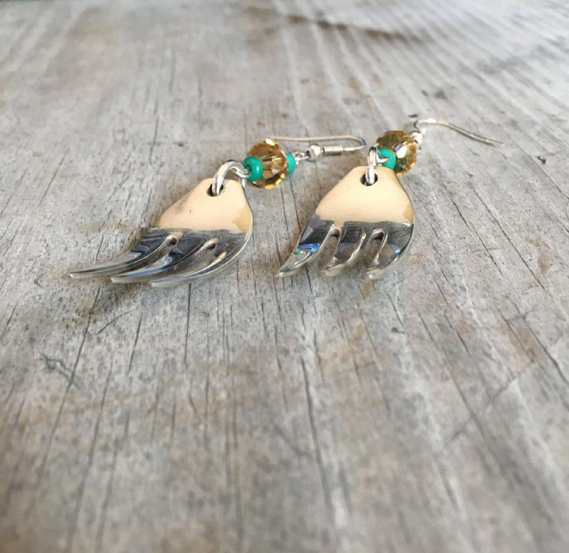 Fork tine earrings with lavender beads showing one-of-a-kind handcrafted design and vintage silverplate detail