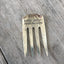 Handcrafted fork bookmark stamped CARPE LIBRUM showing vintage pattern detail