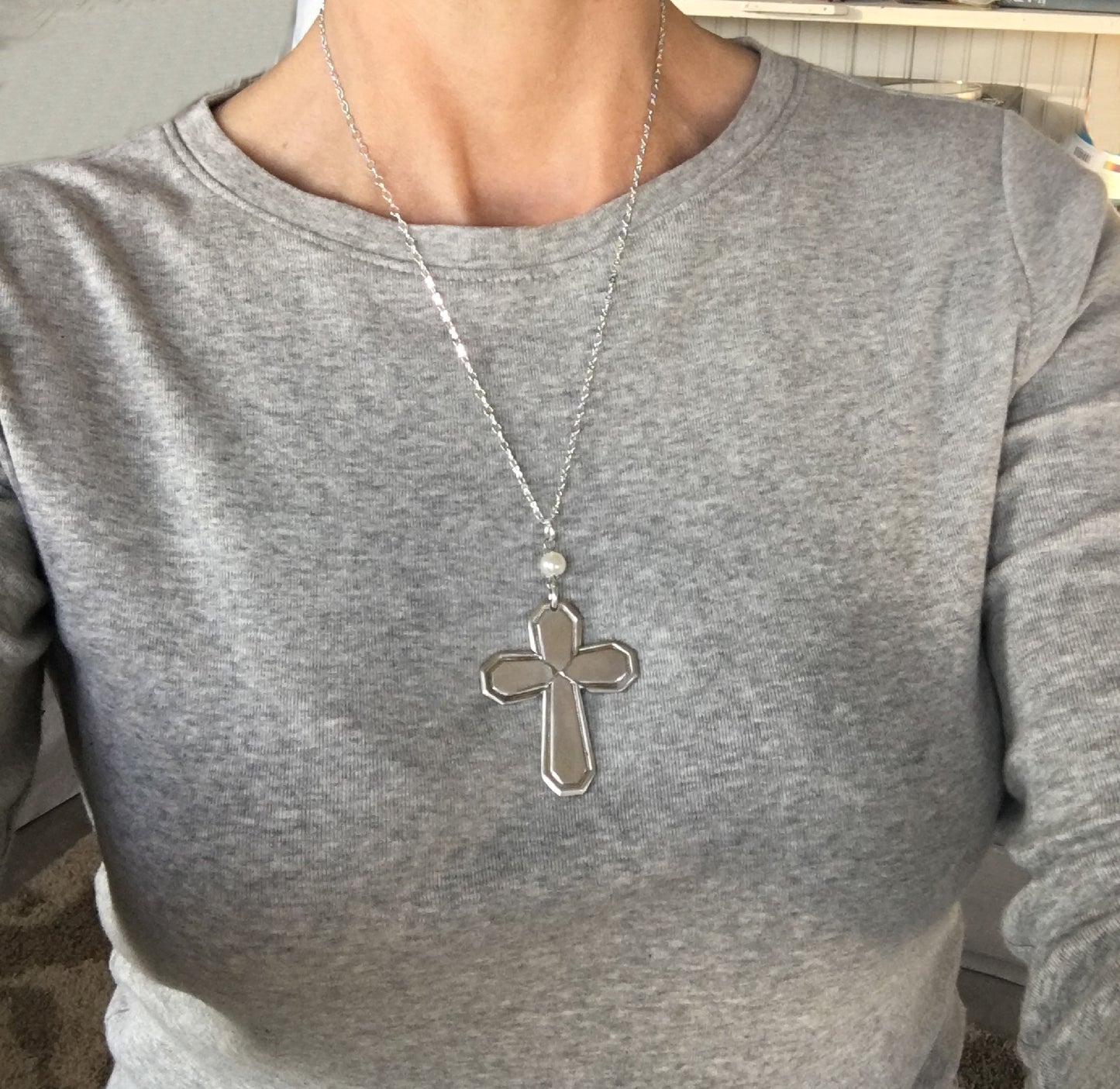 Mayfair spoon cross necklace shown on model - handcrafted upcycled vintage silverware jewelry
