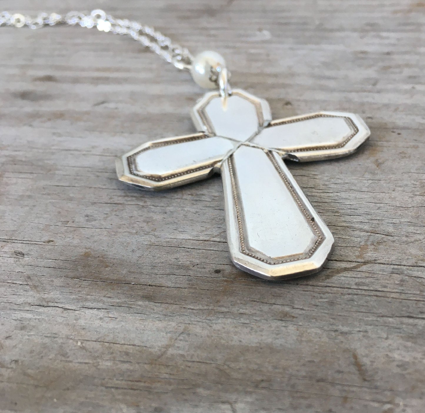 Side view of Mayfair spoon cross pendant showing vintage silverplate pattern and handcrafted detail