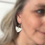 upcycled spoon earrings shown on model for drop length