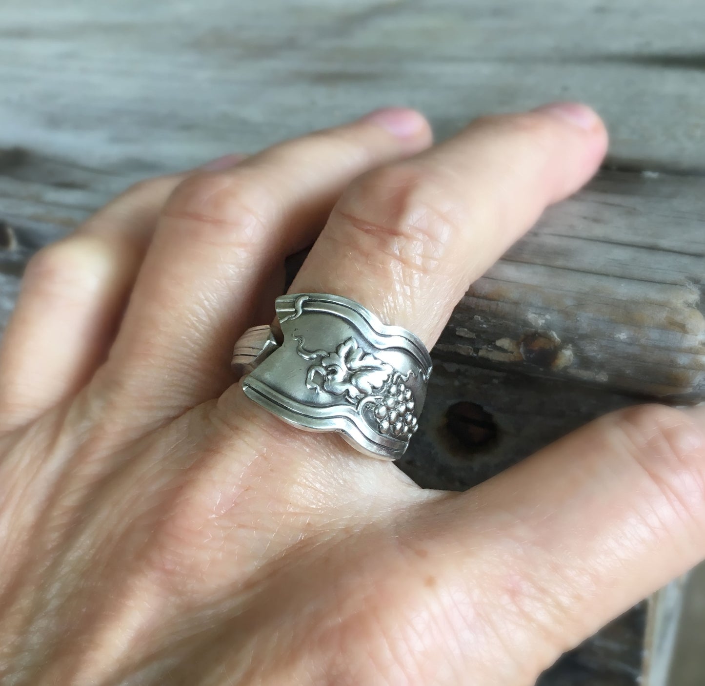 Close Up of Spoon Ring with Grapes Detail Shown on Model