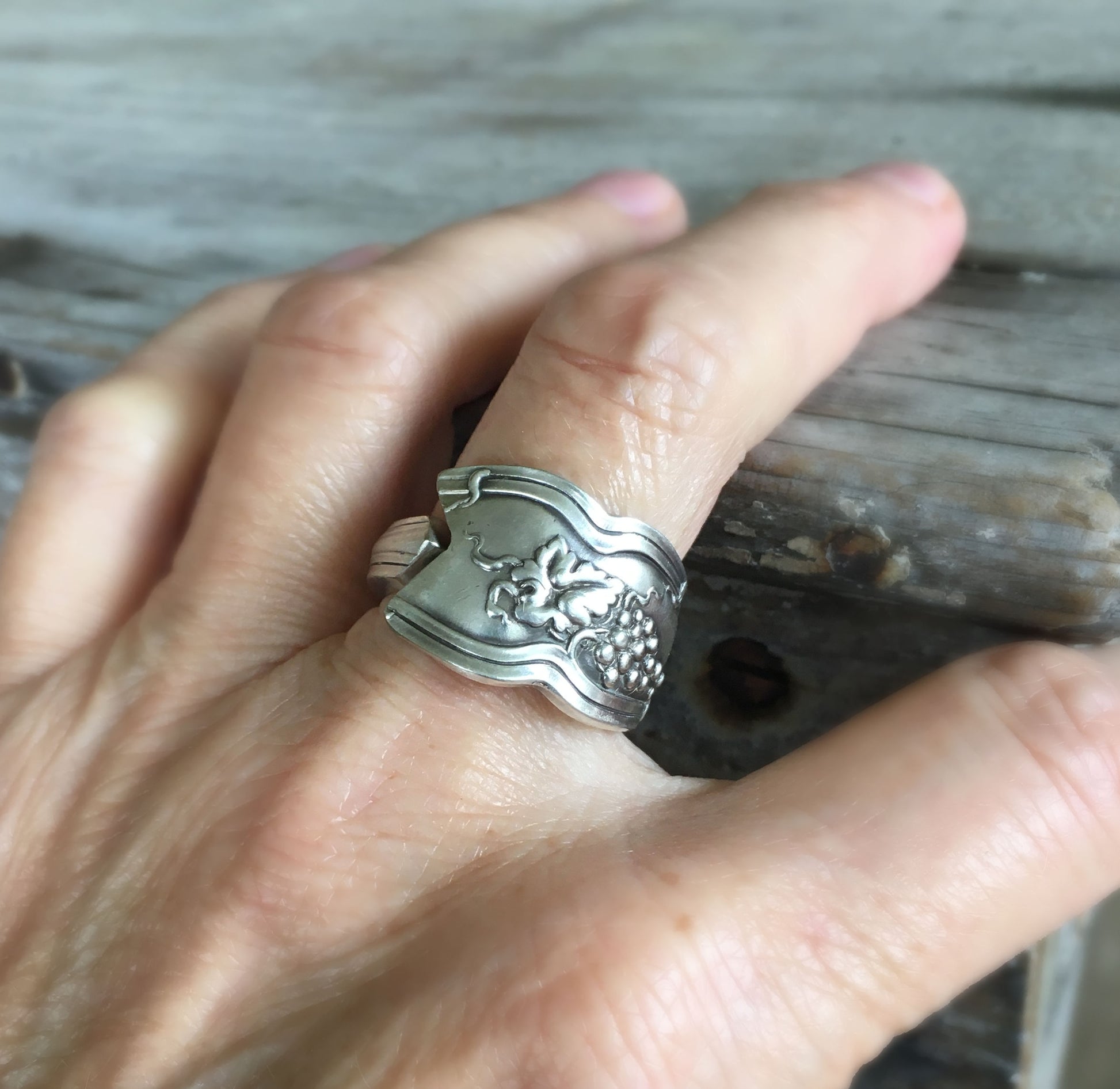 Close Up of Spoon Ring with Grapes Detail Shown on Model