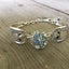 Bracelet made from vintage spoon handles and vintage rhinestone jewelry