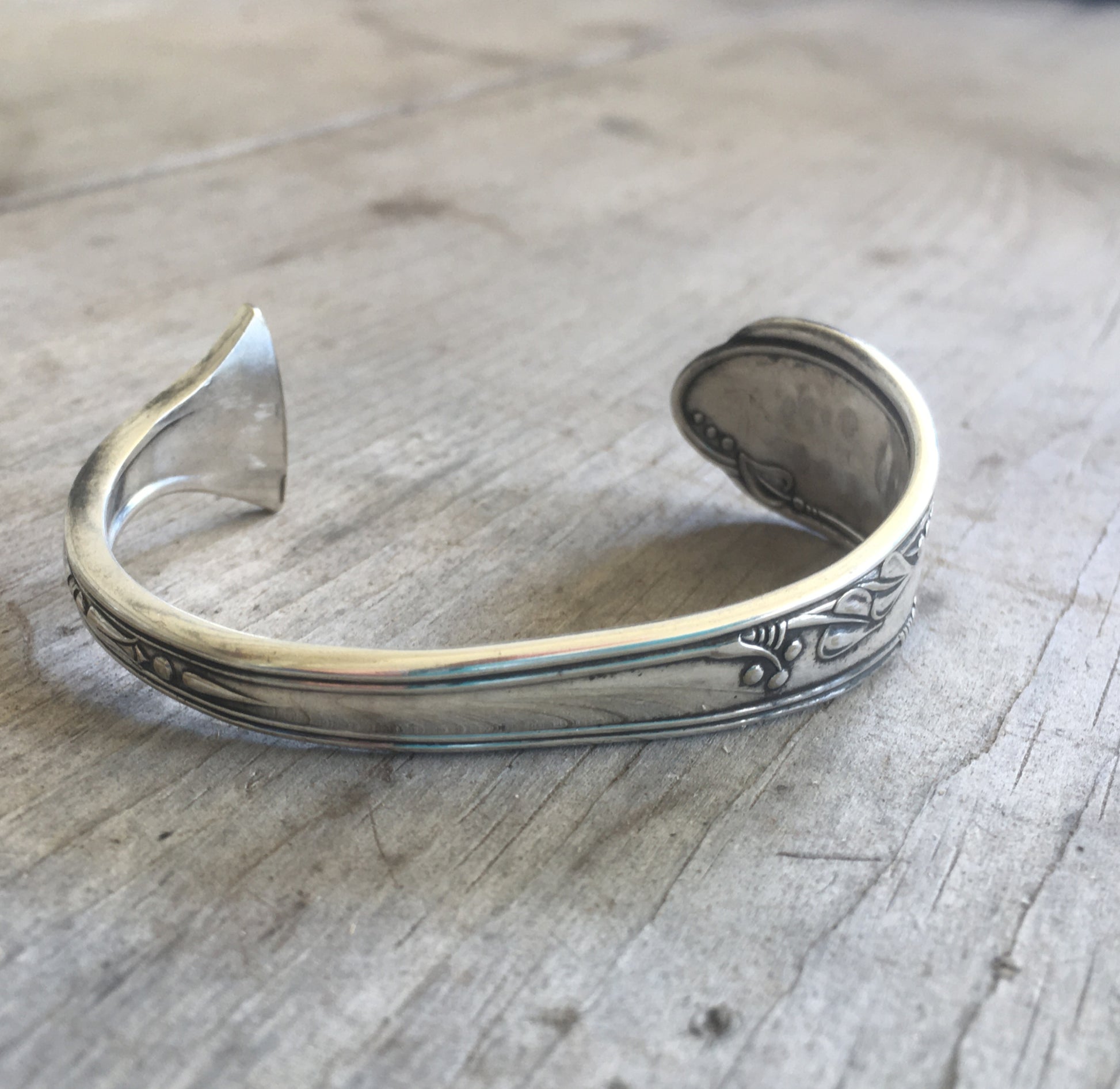 Top View of Hand Stamped Spoon Cuff Bracelet Lead with Love