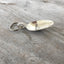 Close-up side view of Cheers martini hand-stamped spoon keychain showing vintage silverware detail and cocktail glass