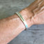 Stamped Spoon Bracelet BADASS International Silver Triumph Shown on Model's Wrist