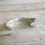 International Deep Silver Stamped Spoon Bracelet BADASS International Silver Triumph