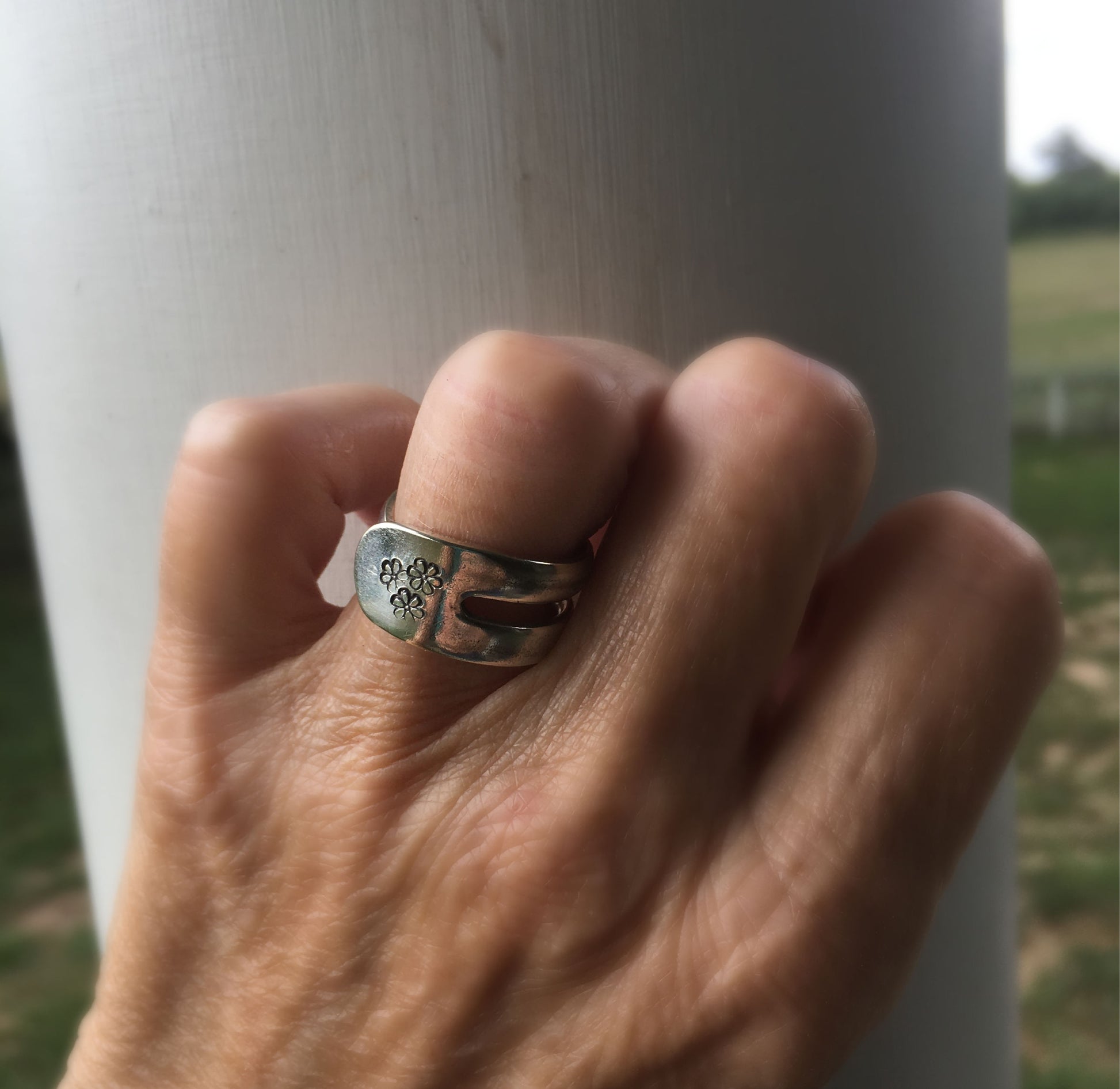 Hand stamped fork ring shown on model