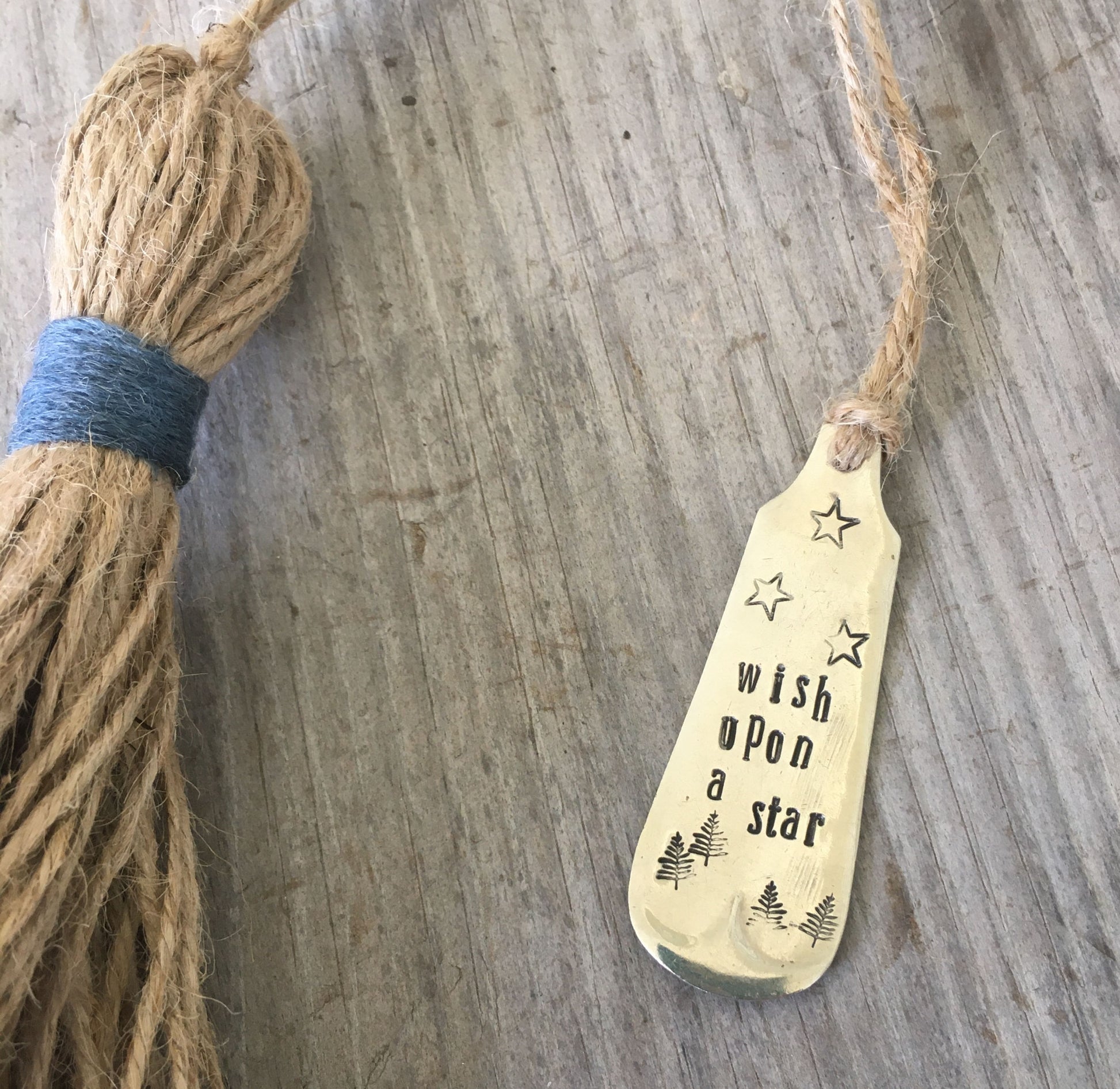 Close up of Hand Stamped SPoon Bookmark with Tassel Wish Upon a Star