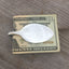 Back side of upcycled spoon money clip