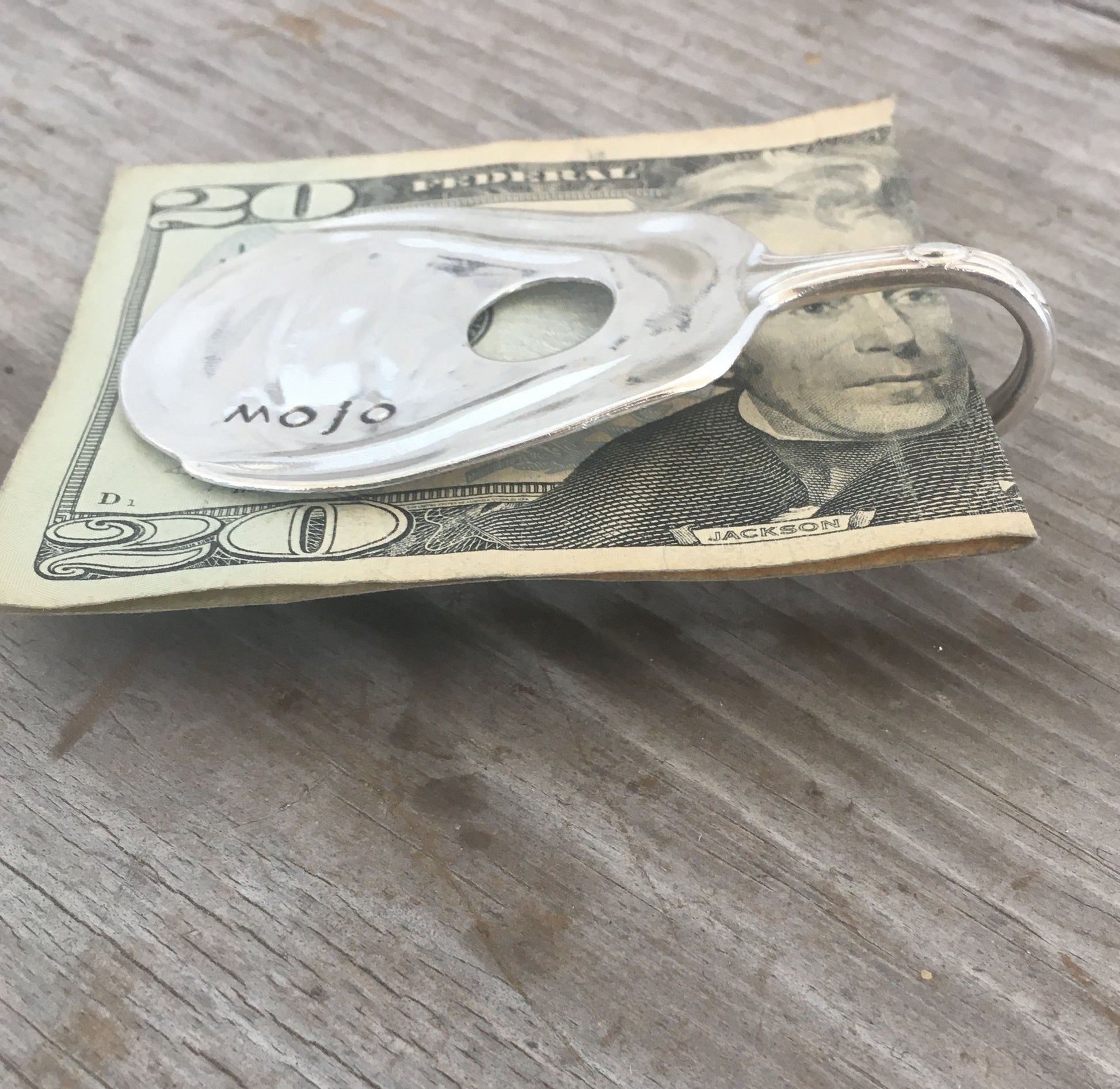 Side profile of vintage spoon guitar money clip MOJO showing clip mechanism