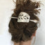 Cake Server Stick Barrette Shown in Model Hair