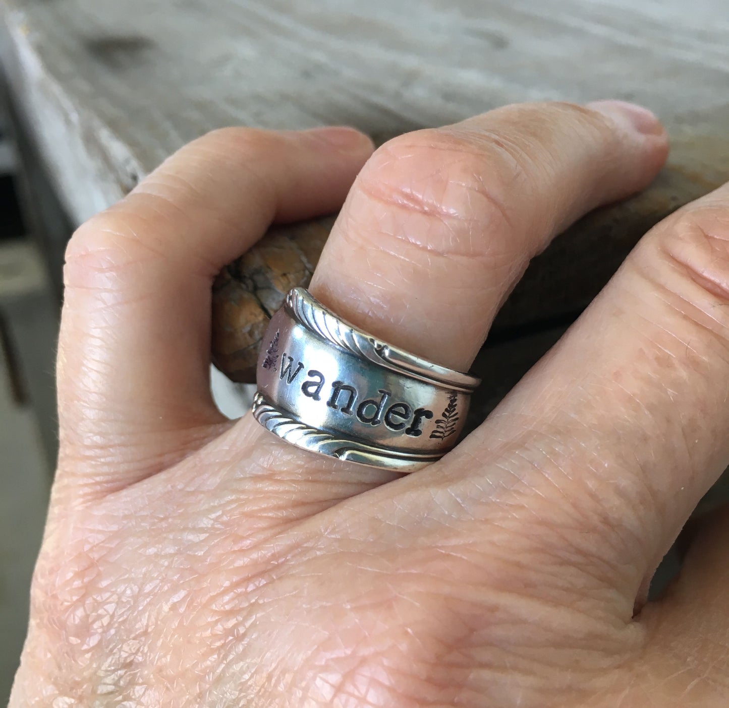 WANDER spoon ring worn on finger displaying size and fit of upcycled silverware ring