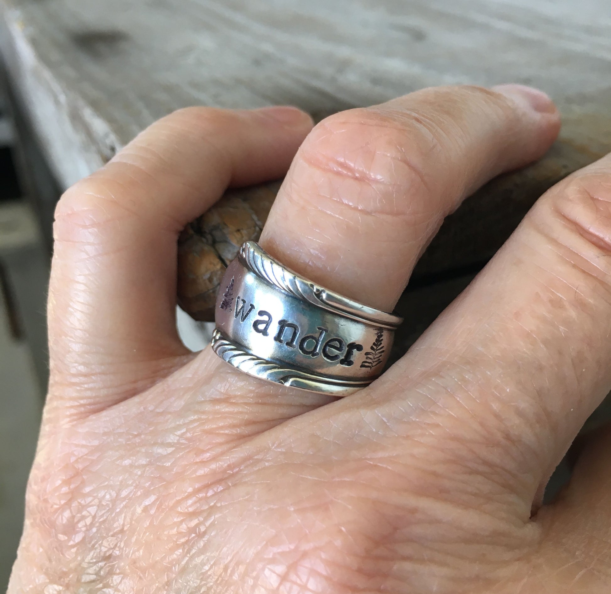 WANDER spoon ring worn on finger displaying size and fit of upcycled silverware ring
