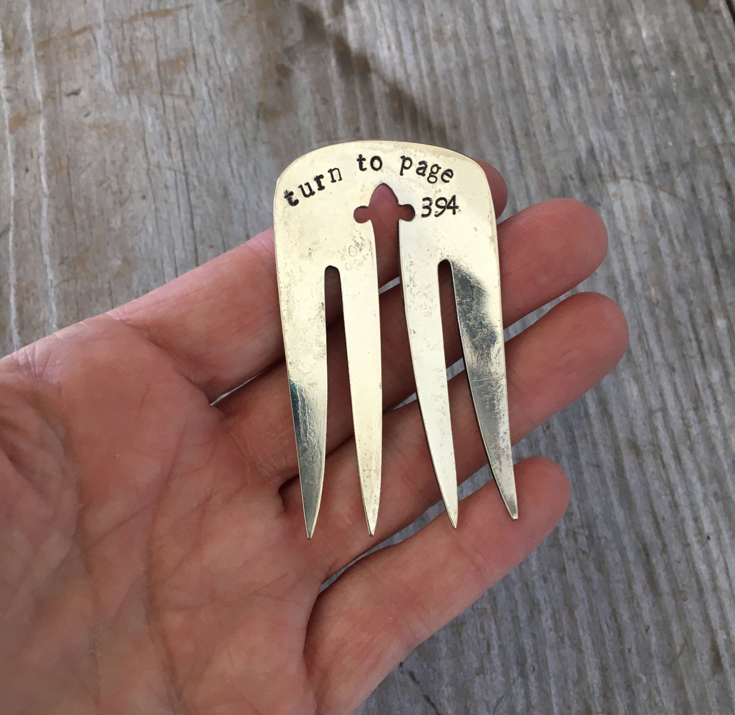 Vintage silverplate fork bookmark TURN TO PAGE 394 showing detailed hand-stamped lettering