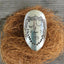 Close-up of Celeste Women of Nature hand-stamped spoon ring with celestial symbols - upcycled vintage silverware