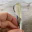 Upcycled vintage silverware spoon handle keychain showing pattern detail and monogram
