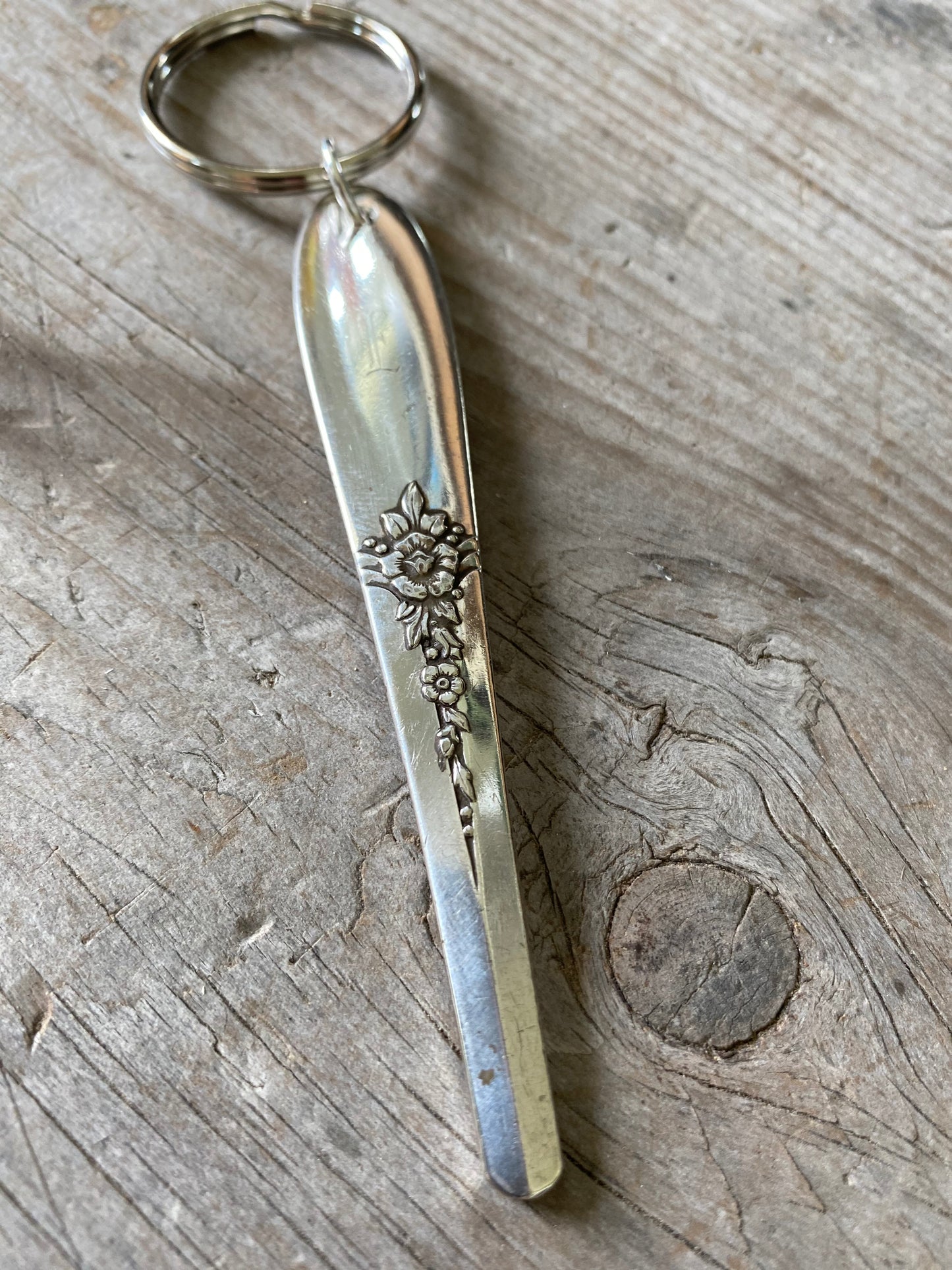 Upcycled vintage silverware spoon handle keychain alternate view showing handcrafted pattern details