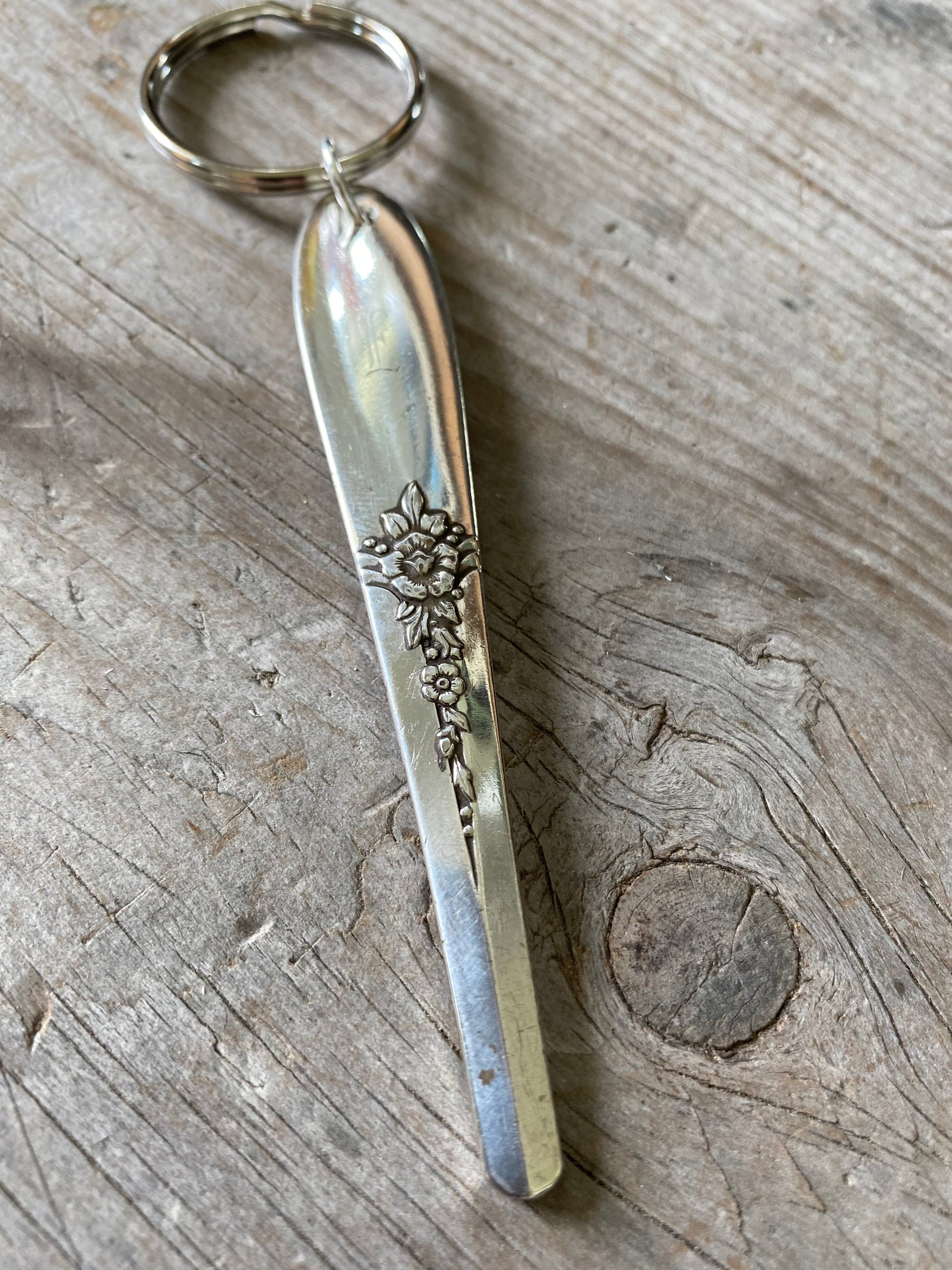 Upcycled vintage silverware spoon handle keychain alternate view showing handcrafted pattern details