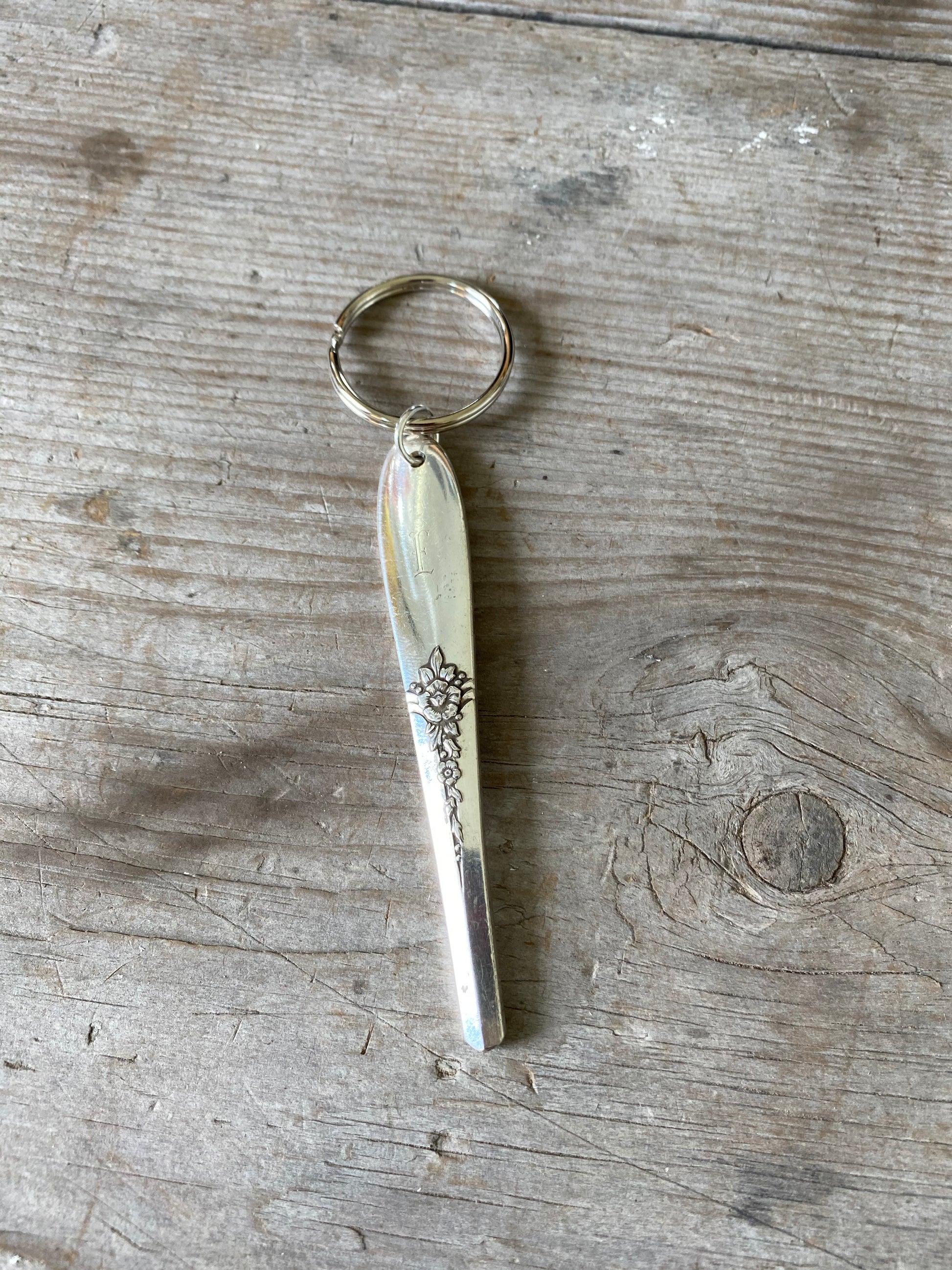Upcycled vintage silverware spoon handle keychain alternate view showing handcrafted pattern details