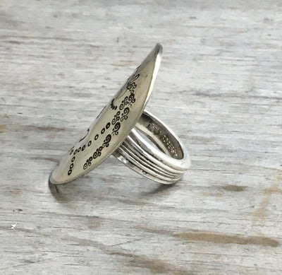 Side view of hand-stamped Tula statement ring - nature-inspired vintage silverware jewelry