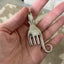 Backside detail of upcycled fork elephant neckalce