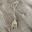 Wide view of elephant necklace and chain 