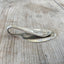 Side view of Spoon Money Clip Handstamped with the word VEGAS