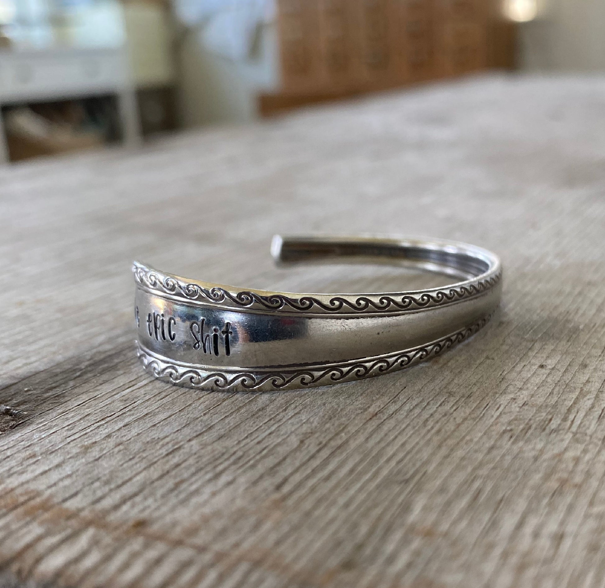 Close up of wave detail on Do Epic Shit Hand stamped spoon bracelet