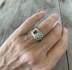 Spoon Ring from 1847 Rogers Eternally Yours pattern shown on model's hand