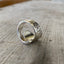 Alternate angle of Spoon Ring in Coil Wrap Shape made with vintage tudor plate silverware handle
