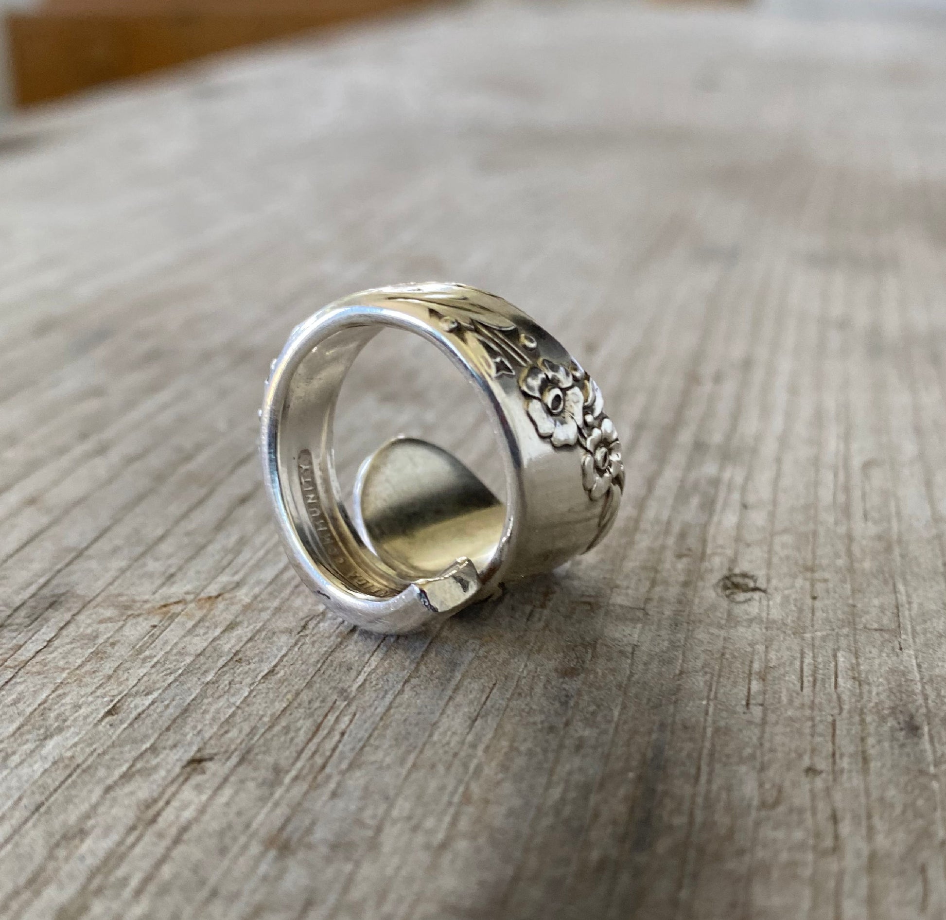 Alternate angle of Spoon Ring in Coil Wrap Shape made with vintage tudor plate silverware handle