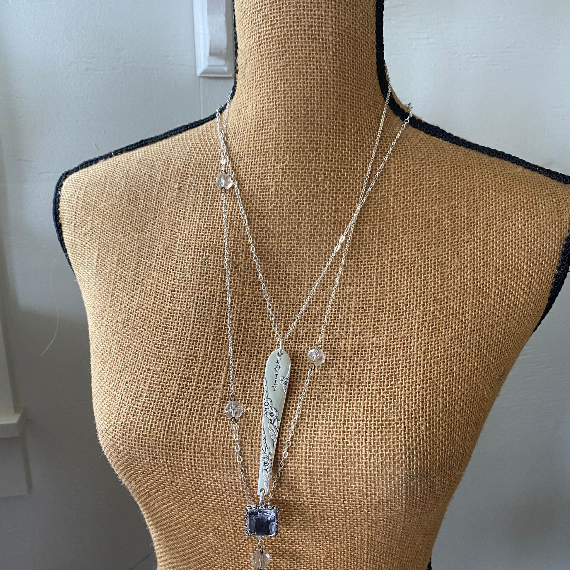FAMILY hand-stamped silverware necklace worn on model showing 4.5-inch pendant and 24-inch chain, personalized keepsake gift for Mom or Grandma