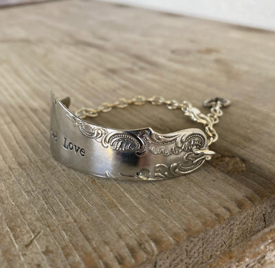 Ornate detail of Spread Love Handstamped Antique Butter Knife Bracelet