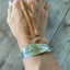 Spread Love Handstamped Antique Butter Knife Bracelet Shown on 6" wrist